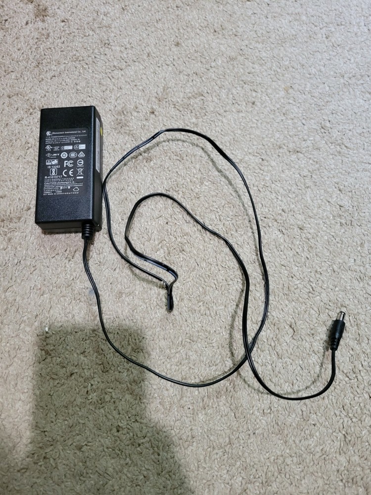 Elementach International AC Adapter Model A140-1120300N with output 12V 3A
