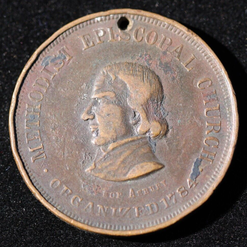 Unknown 1884 Church token Holed