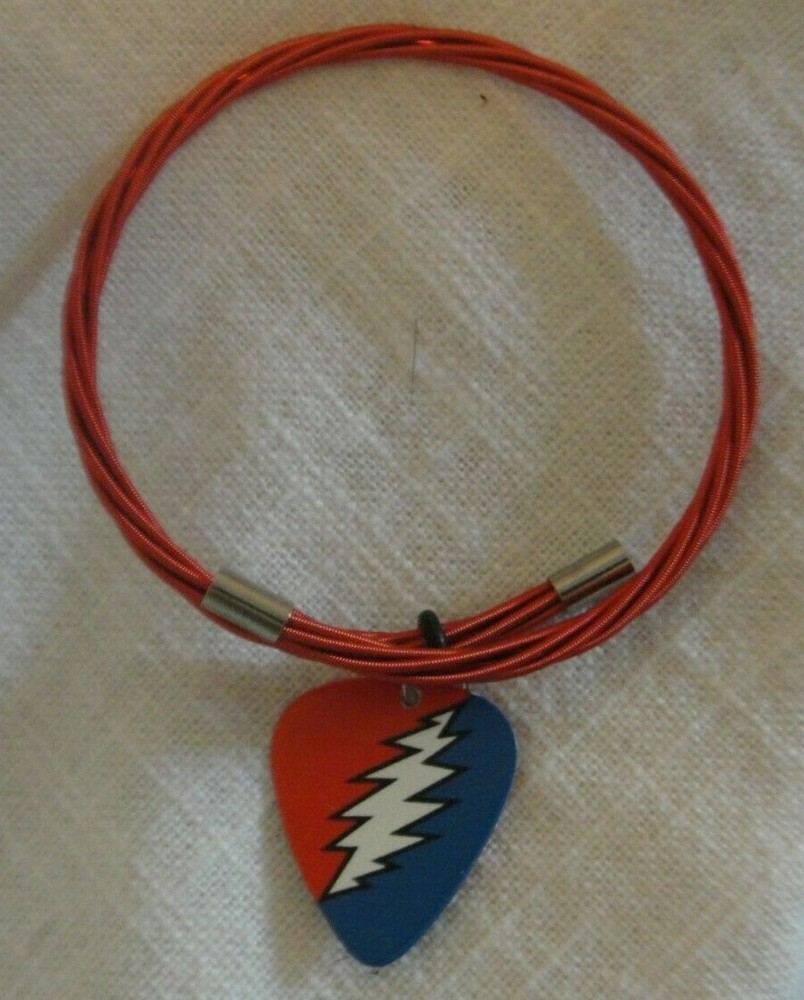 GRATEFUL DEAD BOLT GUITAR PICK ON RED GUITAR STRING BRACELET
