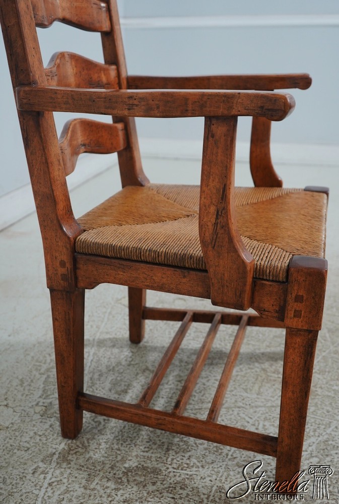 68471: Pair GUY CHADDOCK Distressed Ladderback Armchairs