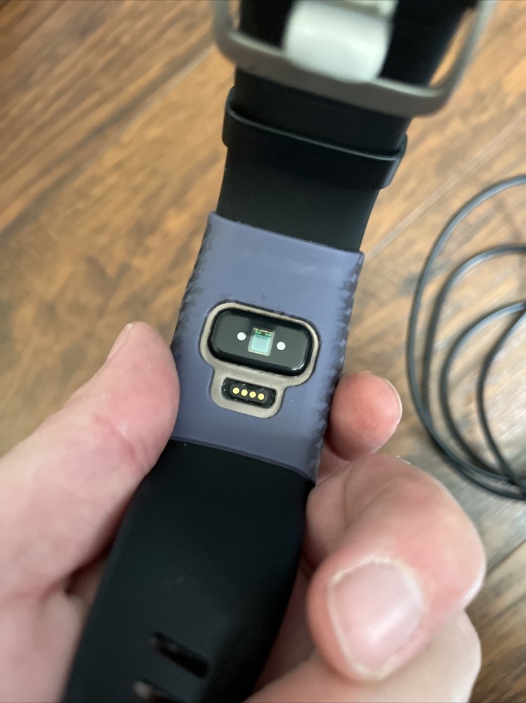 Fitbit Surge Wristband Activity Tracker Doesn’t Hold A Charge. With Charger