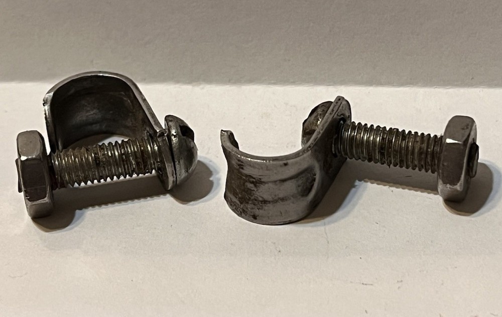 Frame mounted pannier clips--- fasteners---hooks