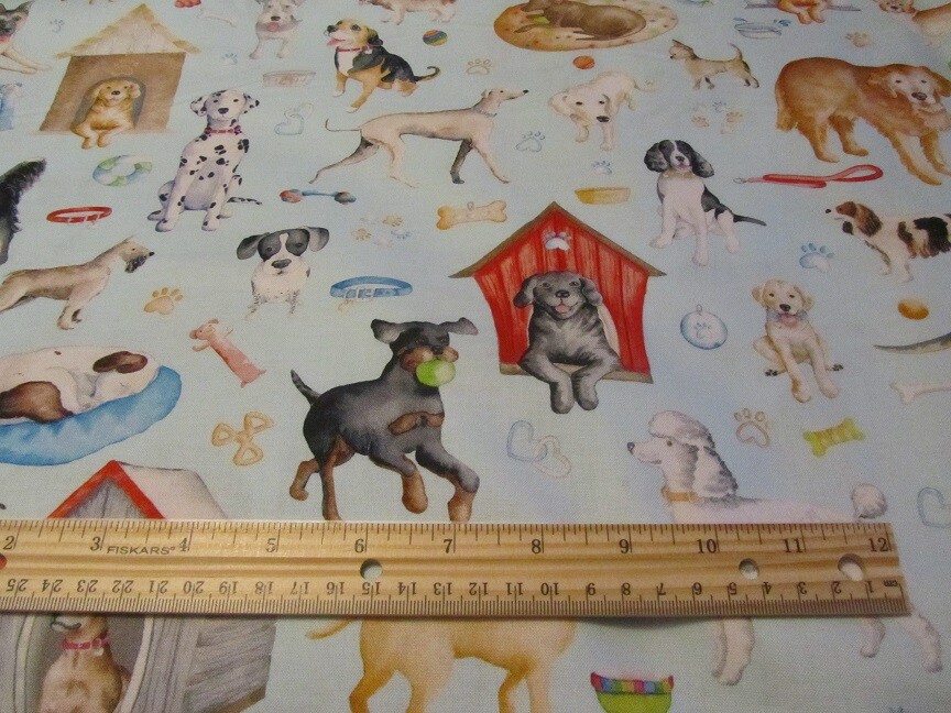 Blue With Multicolored Dog Toss Cotton Fabric BTY