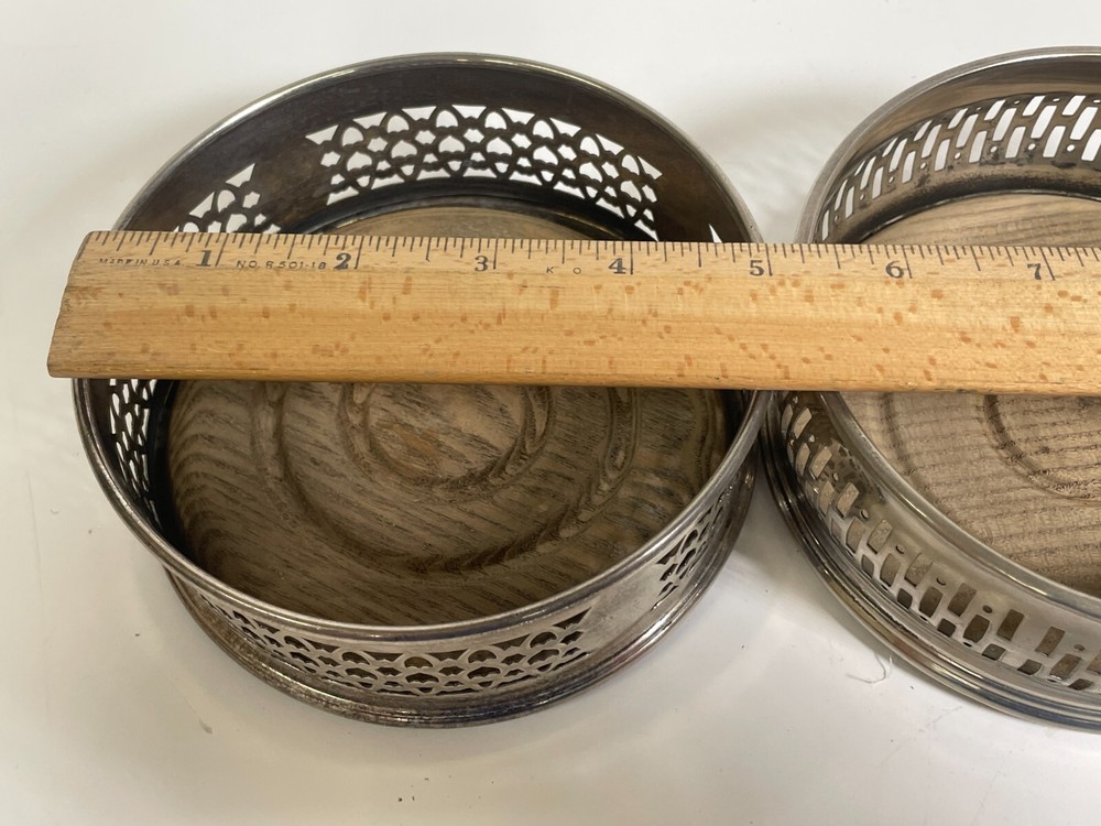 2 Silver Plated Bottle Caster Set Wood Base