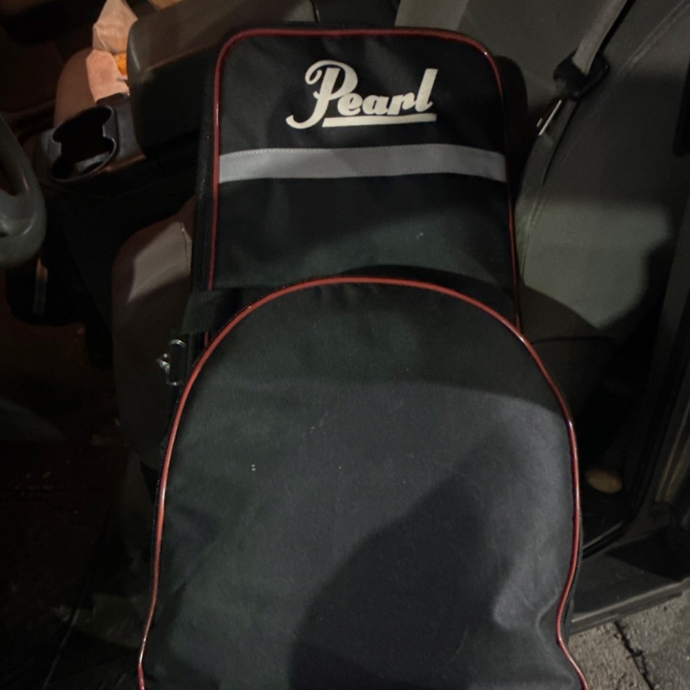 Pearl Snare and bell kit with rolling case. 250 obo.