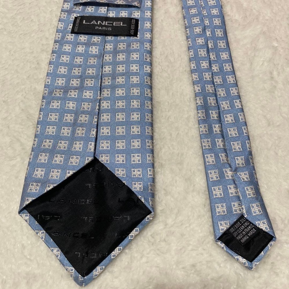 LANCEL PARIS Tie All over pattern 100% silk light blue