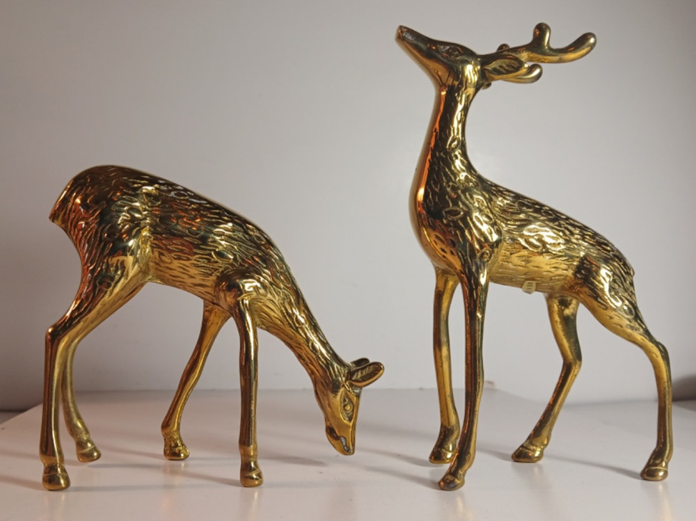 2 Solid Brass Deer. Distributed by Montgomery Ward.