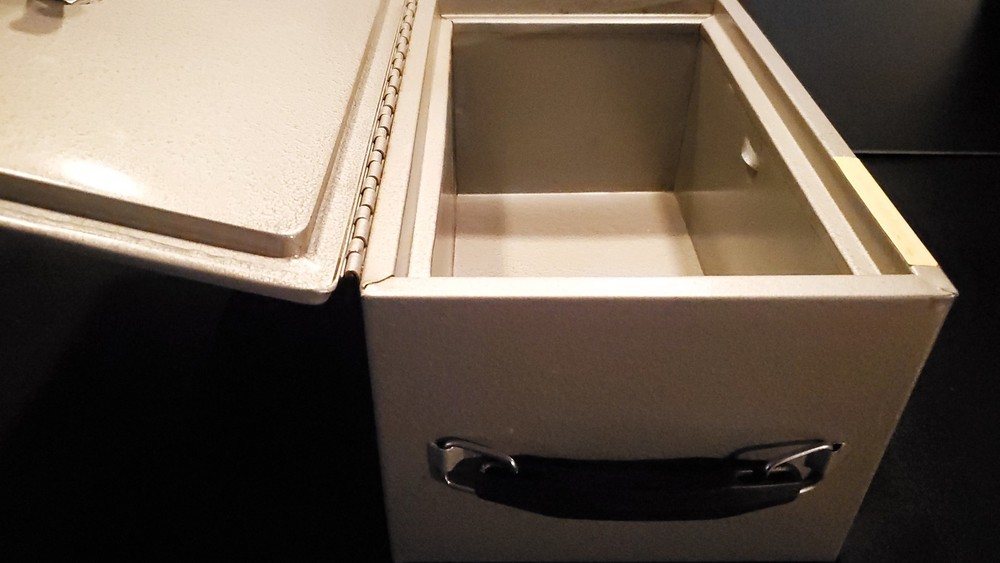 The Protector Fire Safe Grey and Silver New with Key