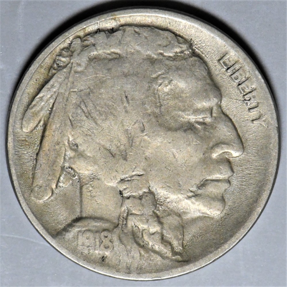 1918 d buffalo nickel with a broken die going through liberty