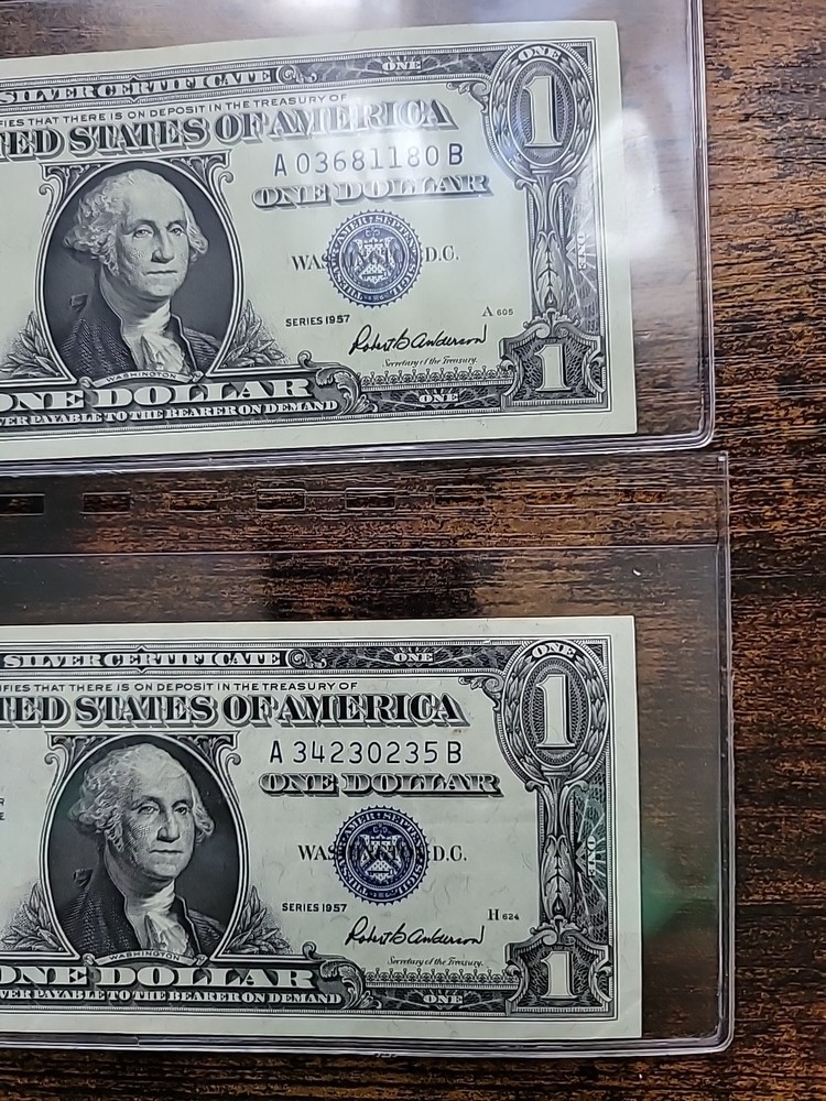 One Dollar 1957 Silver Certificates Blue Seal. Three Total