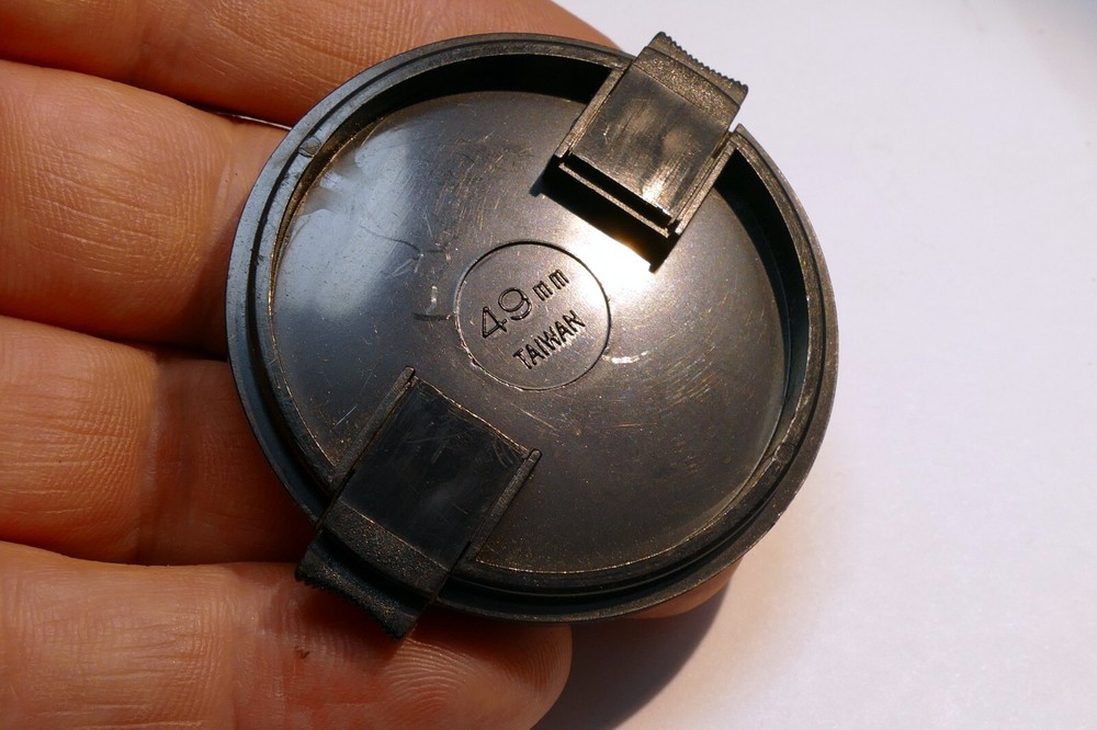 Front 49mm Lens cap snap on type made in Taiwan