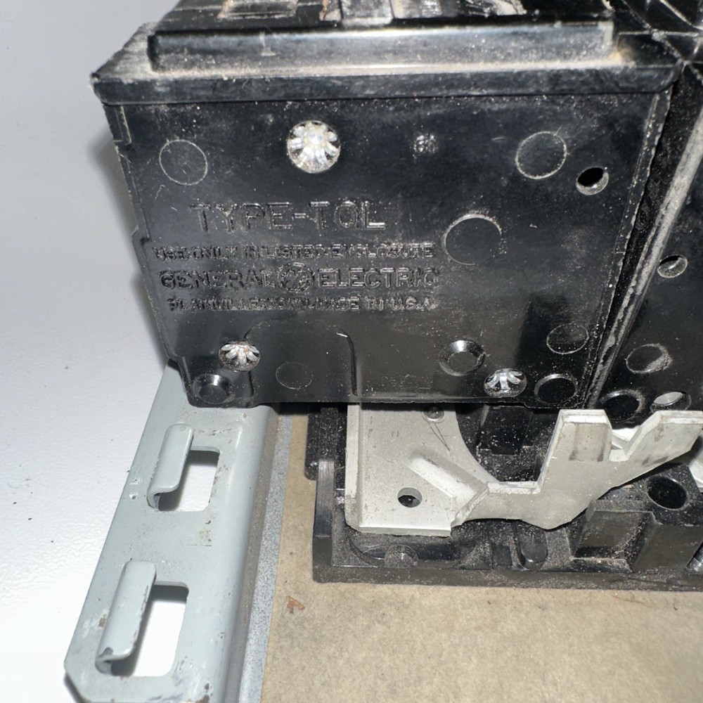 Electrical Load Center, service panel interior containing GE circuit breakers