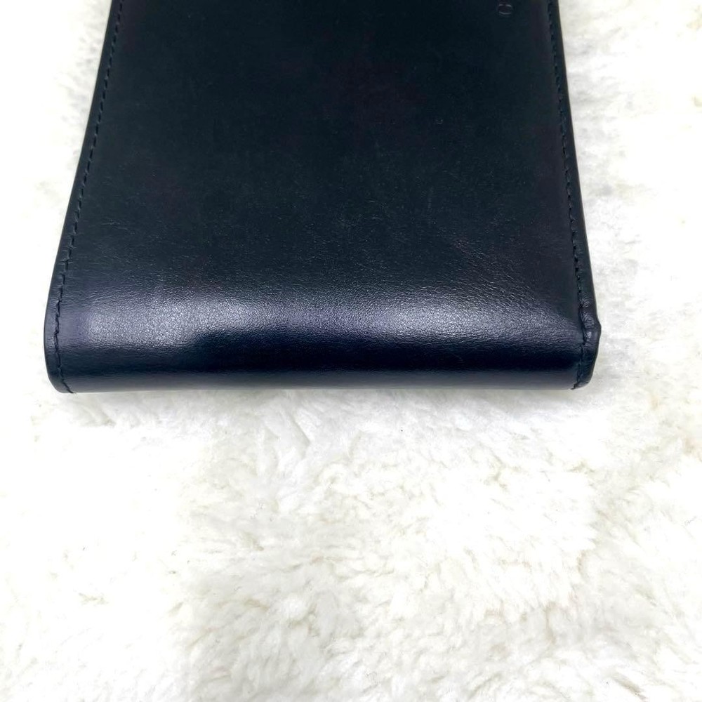 GUCCI Embossed Logo Black Folding Wallet