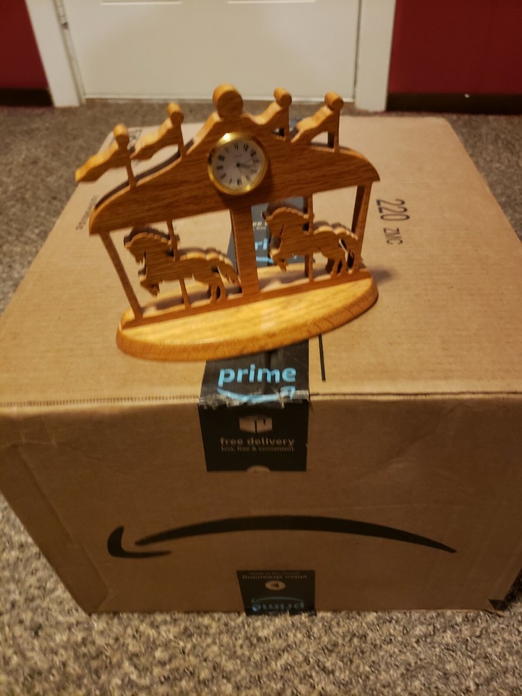 Carved wood Carousel horse clock