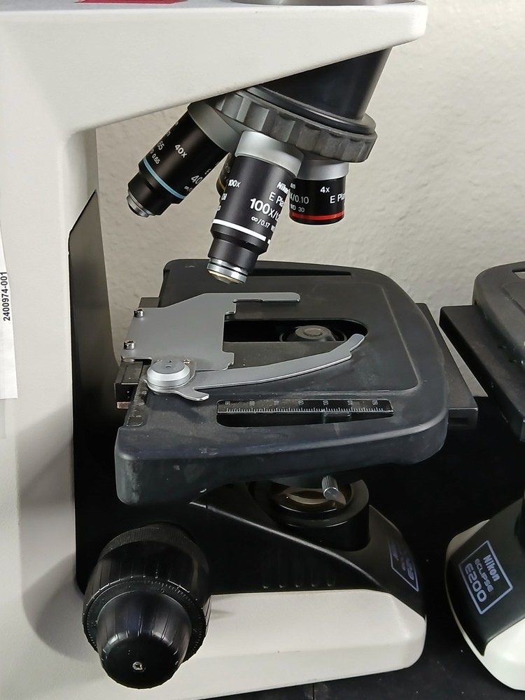 (2) Nikon Eclipse E200 Microscopes & E Plan 4 10 40 100X Oil Sets (No Heads)