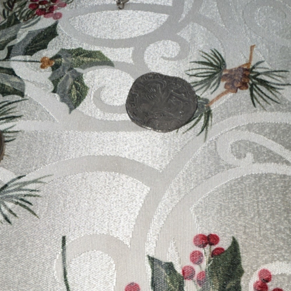 Sleeping Aid Product with Coin for Scale on Decorative Surface
