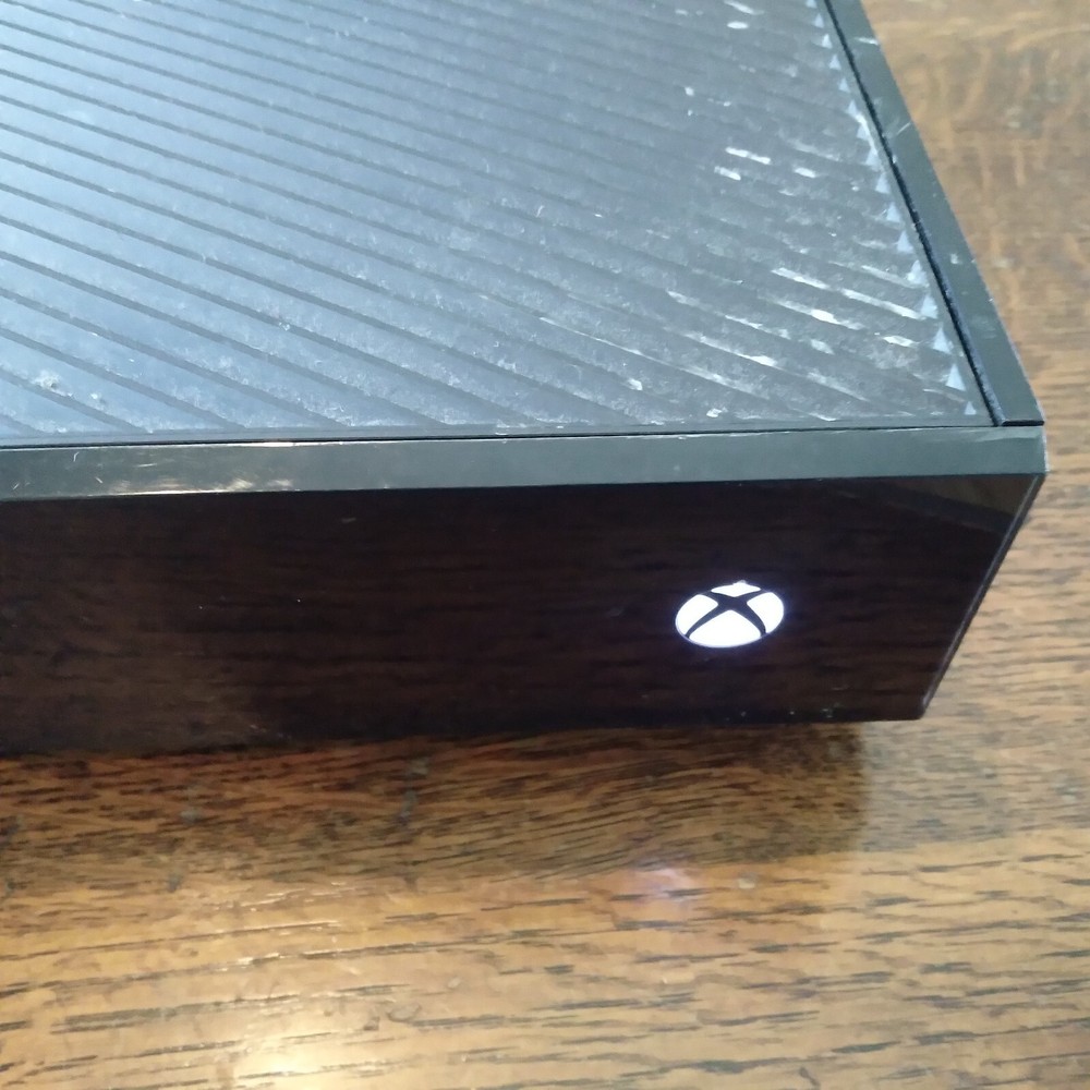 Xbox One Console with power cord and 4 games