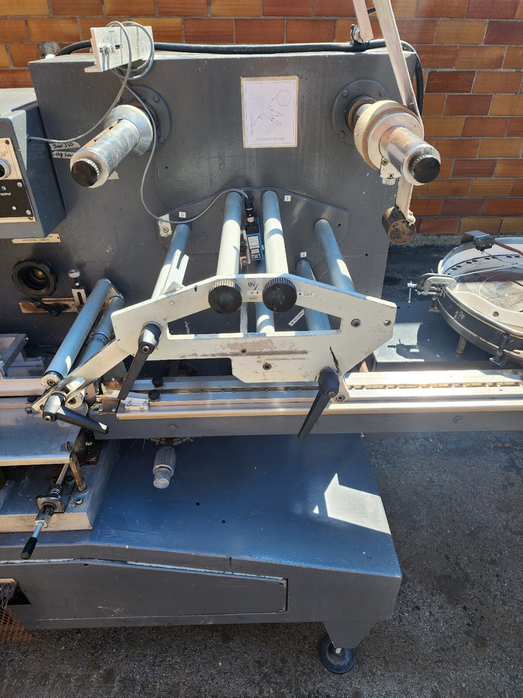 SEMCA HORIZONTAL HIGH SPEED WRAPPING MACHINE MODEL 90