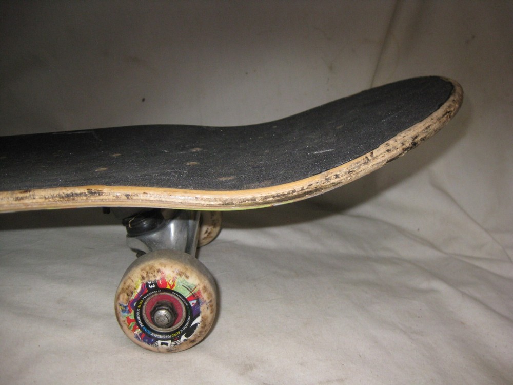 pre-owned skateboard Tensor trucks Psychedelic wheels Blind grim reaper deck