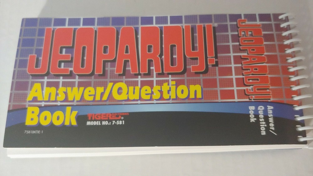 Jeopardy Handheld Electronic Game Complete with Answer/Question Book & Cartridge