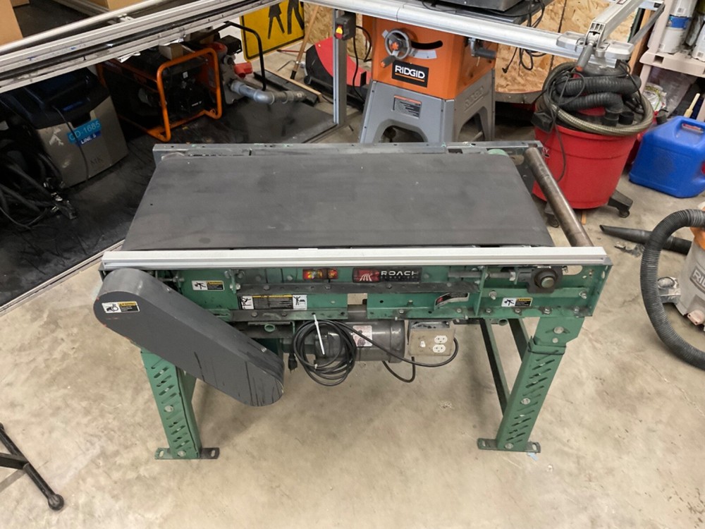 Roach conveyor belt system