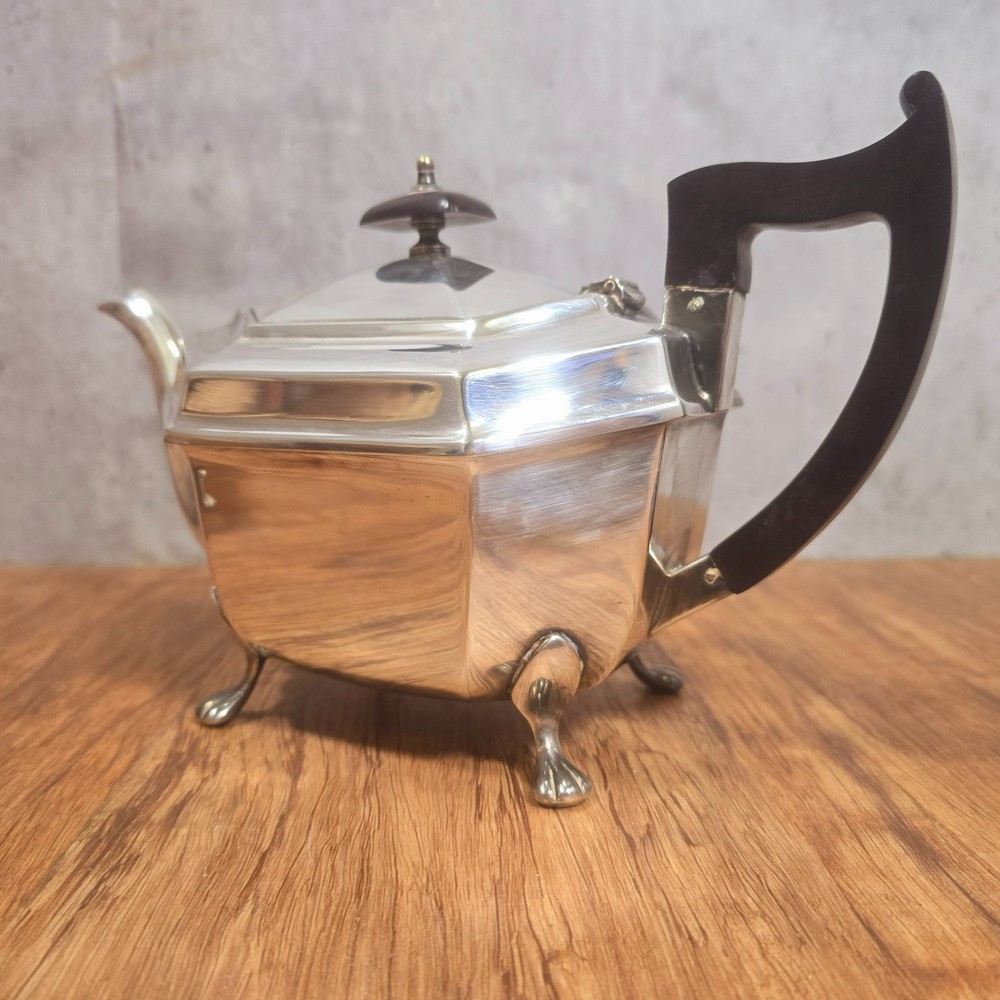 Early Art Deco Three Piece Sheffield Silver Plate Tea Set, Ebonised Handle. Prop