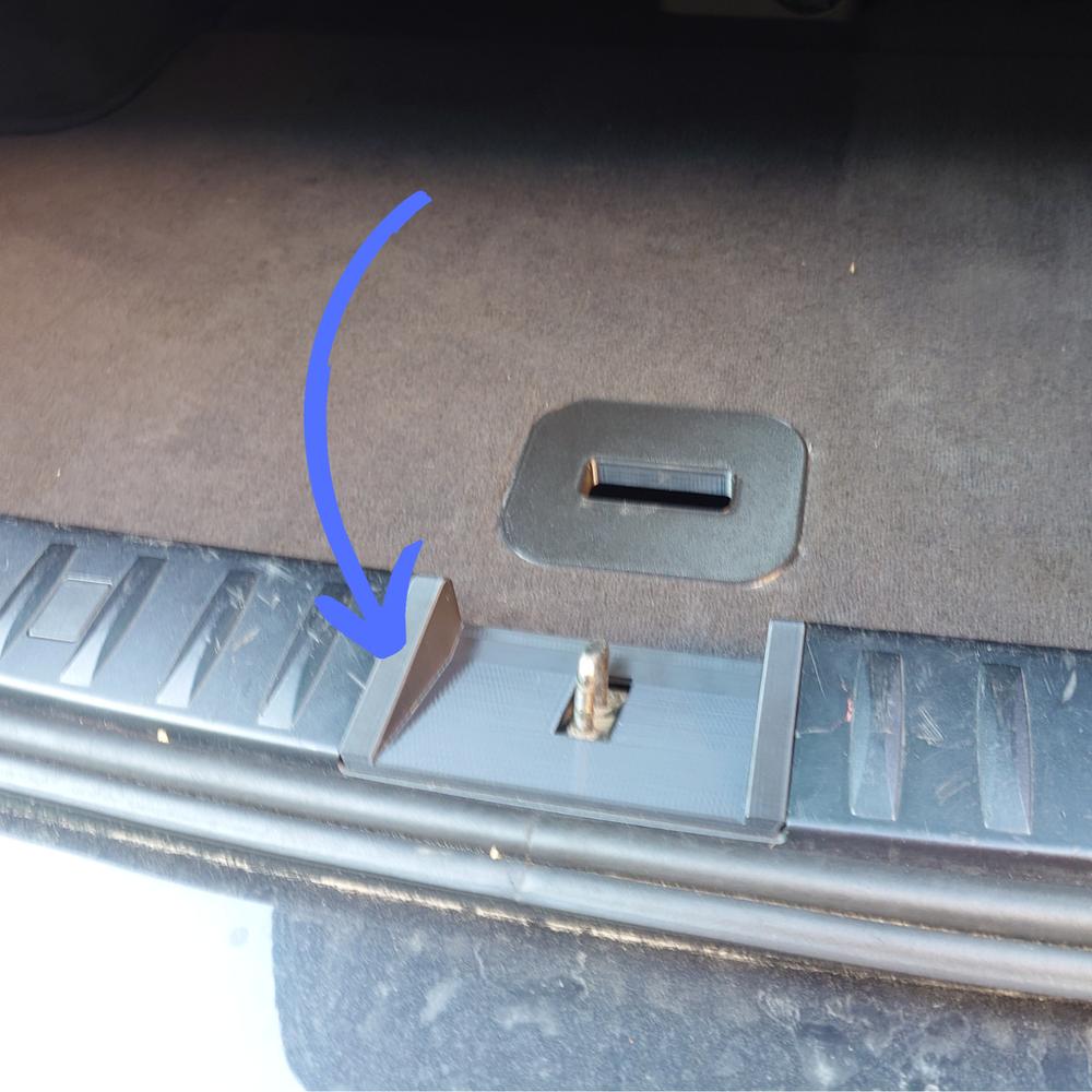 BMW E91 trunk latch cover