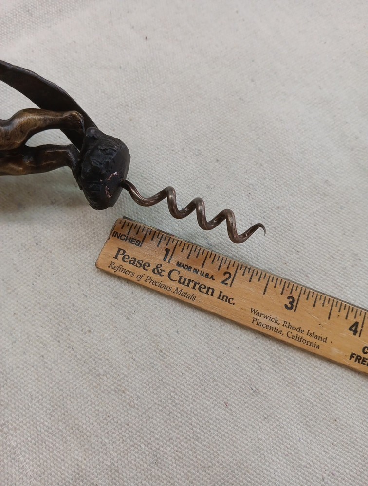 COLLECTABLE BRONZED CORKSCREW WITH WINGED CHERRUB HANDLE
