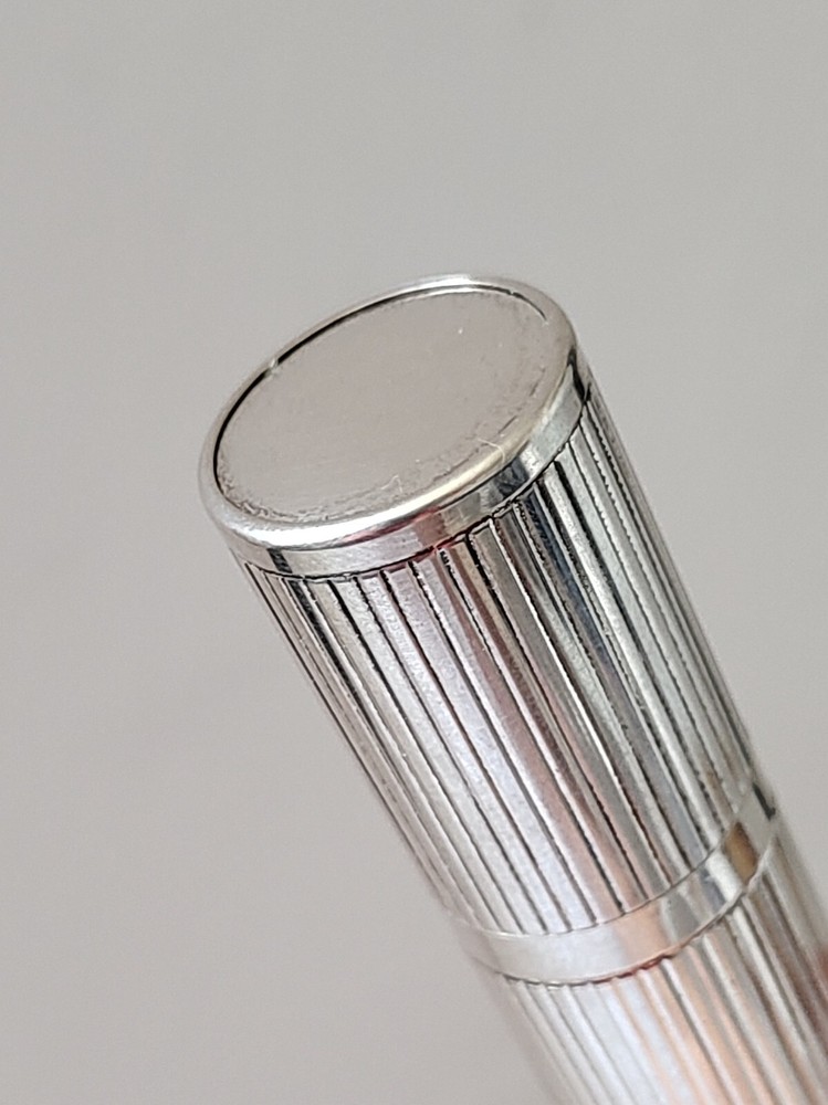 Perfume holder + makeup brush  