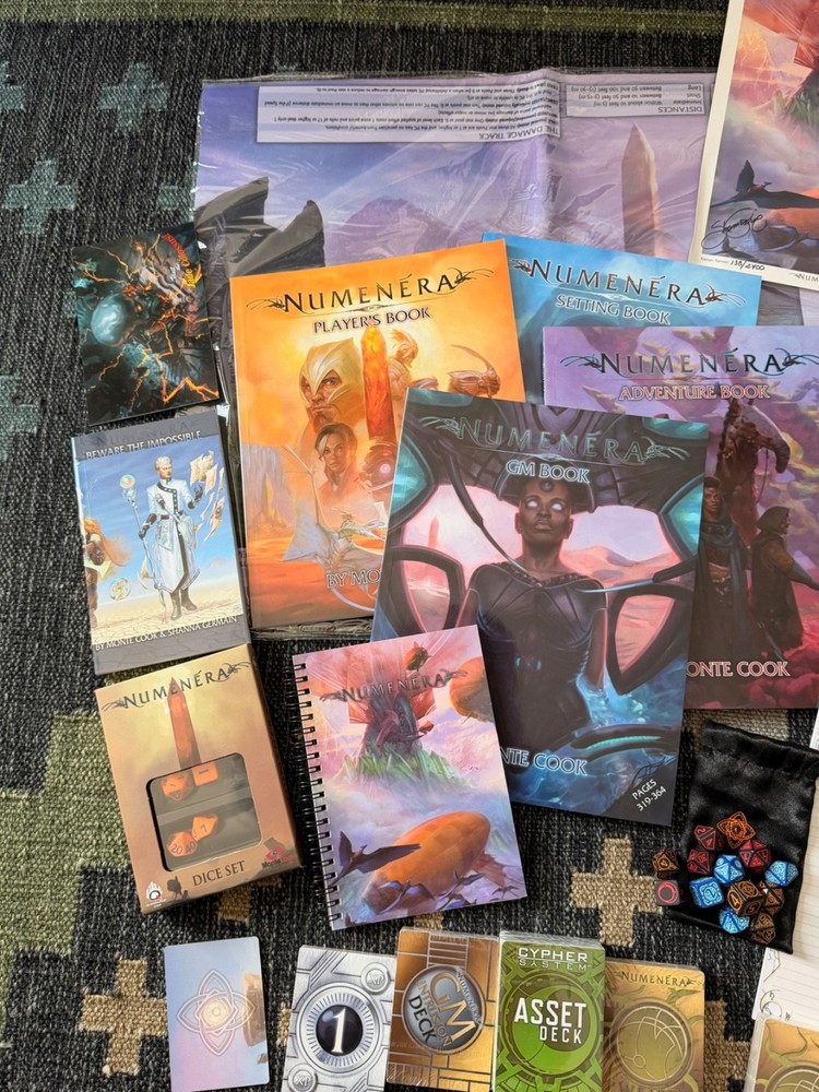 Numenera Reliquary Boxed Set (Kickstarter) and Q-Workshop Dice Sets