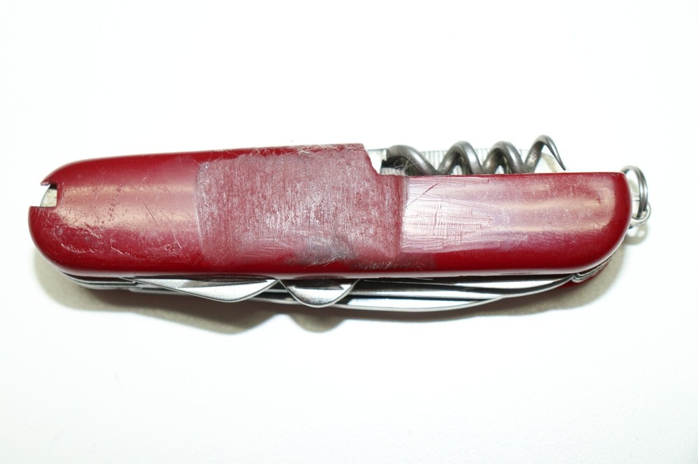 Rostfrei Pocket multitool red plastic handles gold mark E633