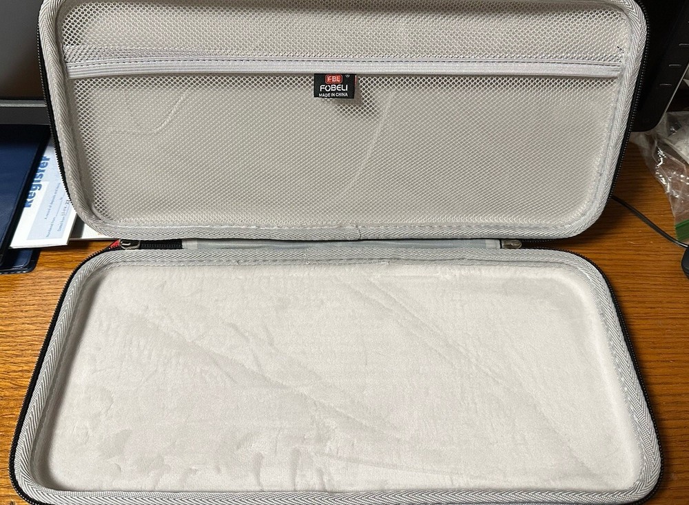 Zipped Carrying Case With Handle and felt Interior.