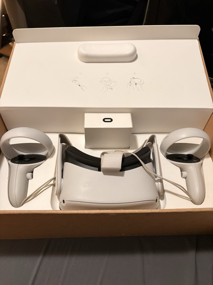 Oculus Quest 2 Fully tested and works perfectly Includes headset and controllers