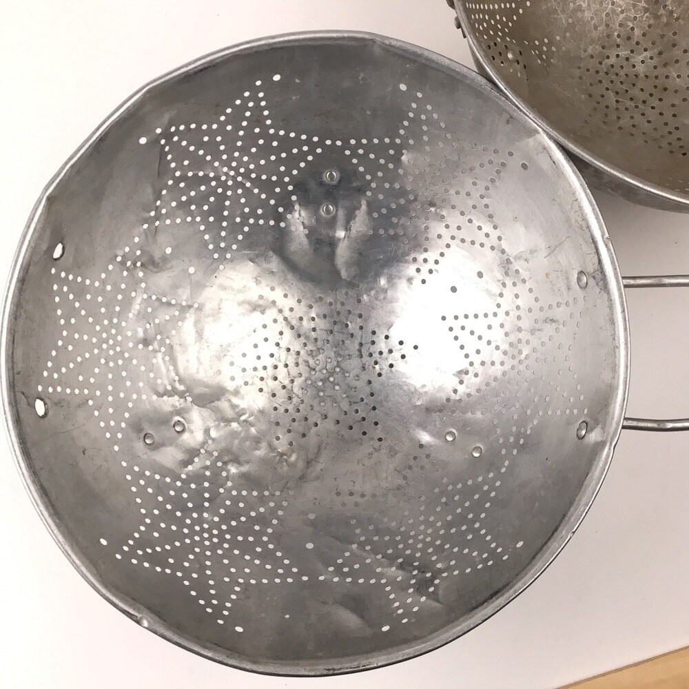 Retro Set of two large 11" aluminum star pattern colanders