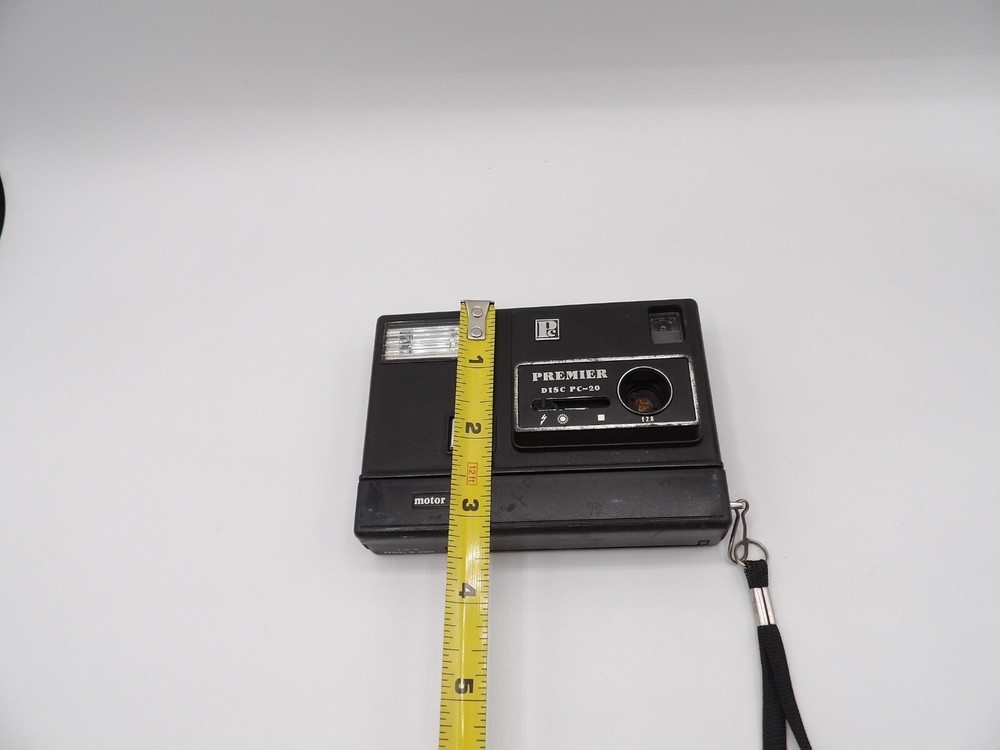 Vintage Premier PC-20 Motorized Disc Camera Point and Shoot Flash Untested