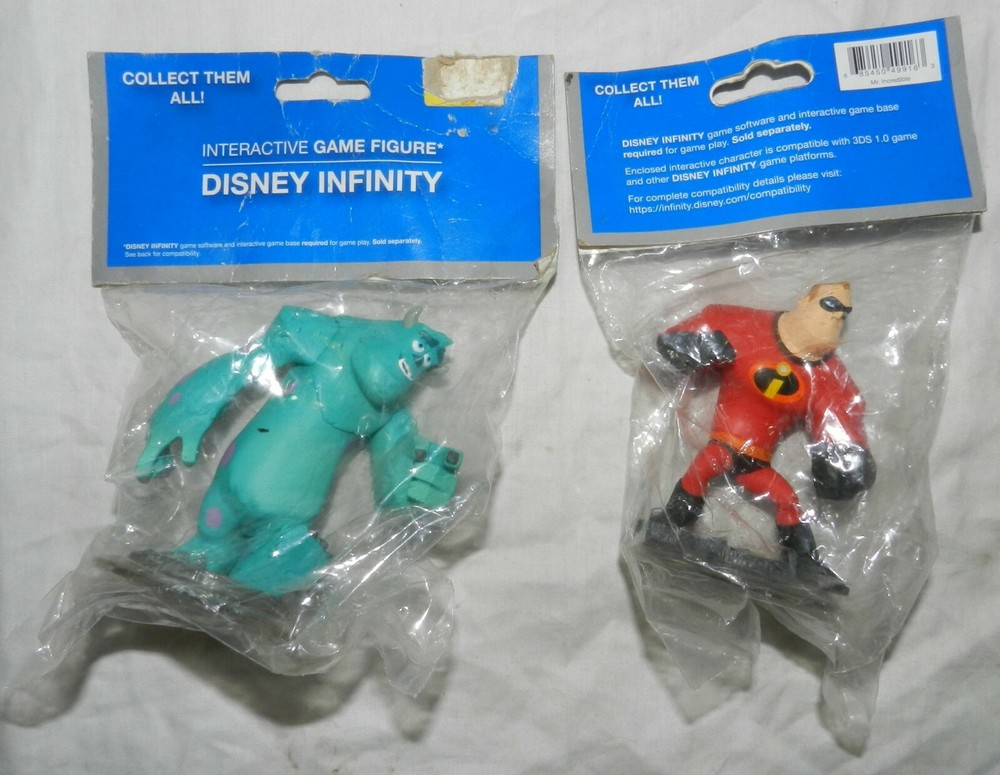 2 New in package Disney Infinity Interactive Game Figures, Scully + Mr Impossibl