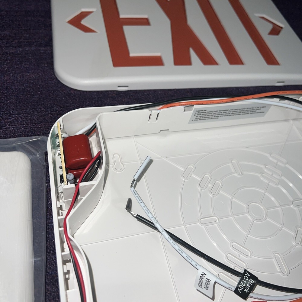 New Exit Sign .Face Plate and mounting bracket Battery pack tested image.