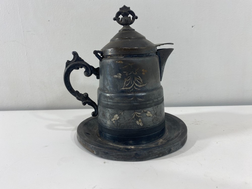 Antique Ornate Silver plated cream dispenser