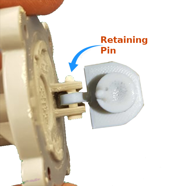 Water flow sensor paddle retaining pin