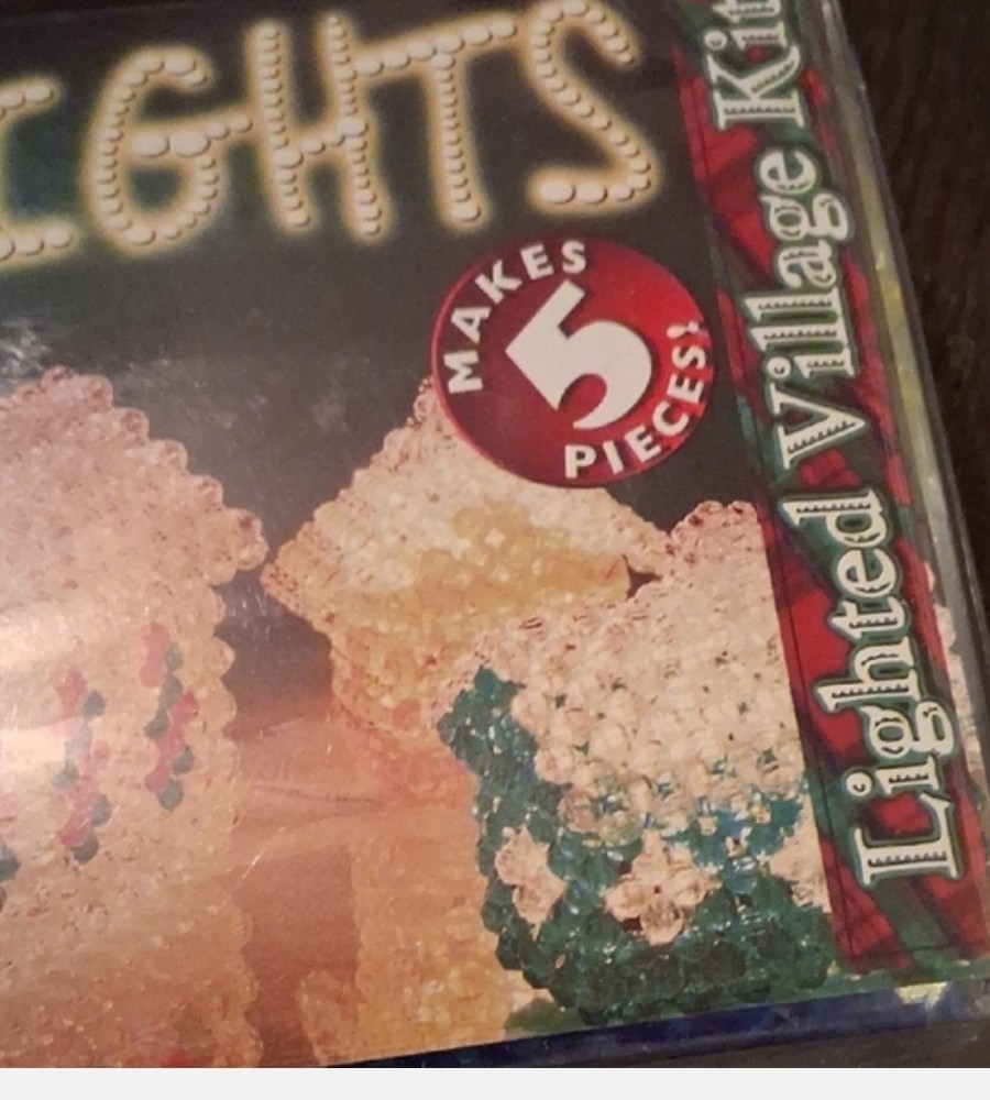 Vintage "Beads D'Lights Village Kit" used to create decorative structures.