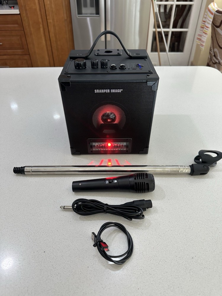 Sharper Image Model: SBT1050 Rechargeable Karaoke Singing System.
