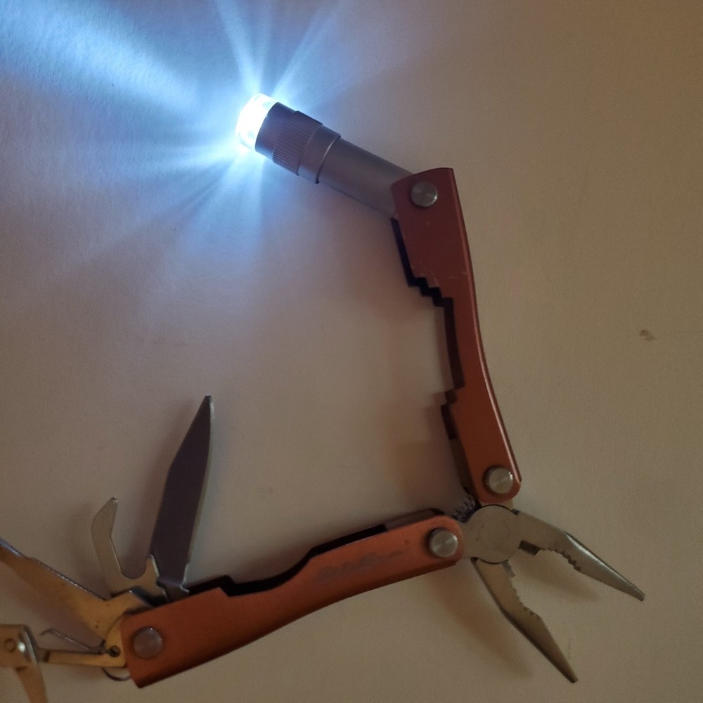 8 Function Scout Tool includes LED Light By Eddie Bauer Copper