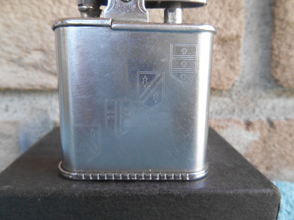Vintage Ronson WHIRLWIND CHROME CIGARETTE LIGHTER. ETCHED 14TH CENTURY SHIELDS