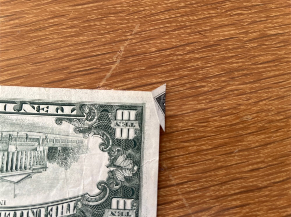 misprint and cut dollar bill