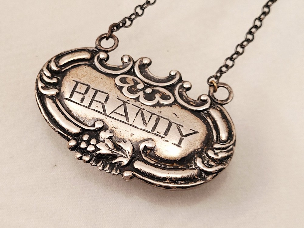 VINTAGE STERLING SILVER " BRANDY " BOTTLE TAG