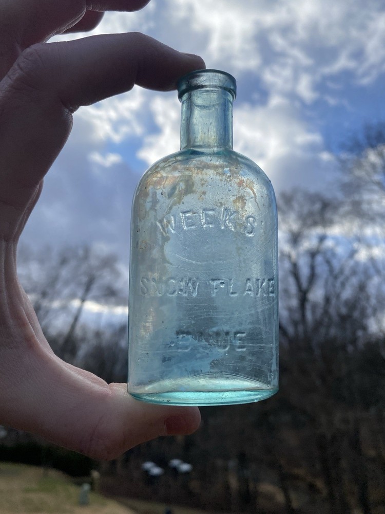 Week’s Snow Flake Blue Antique Bottle