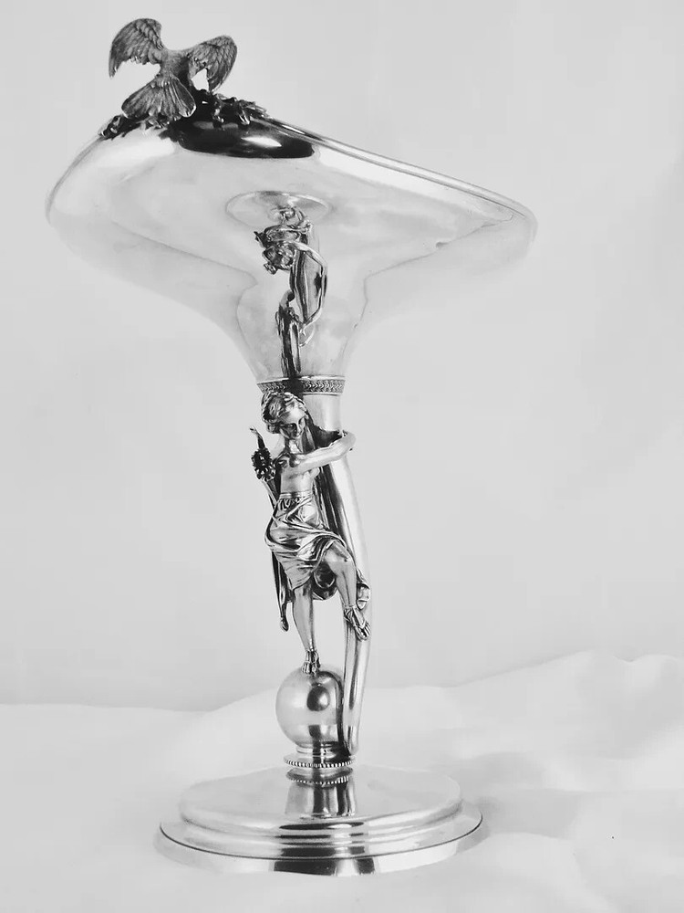AN ARTISTICALLY PROGRESSIVE GORHAM STERLING SILVER FIGURAL FRUIT STAND,1869