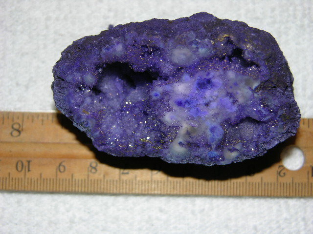 Geode cut & polished half with colored crystal center 3 inch E84