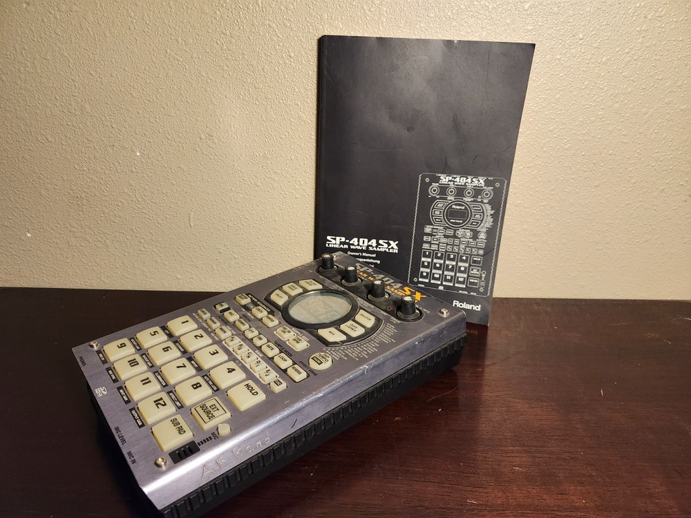 Roland SP-404SX Compact Linear Wave Sampler USED w/ manual