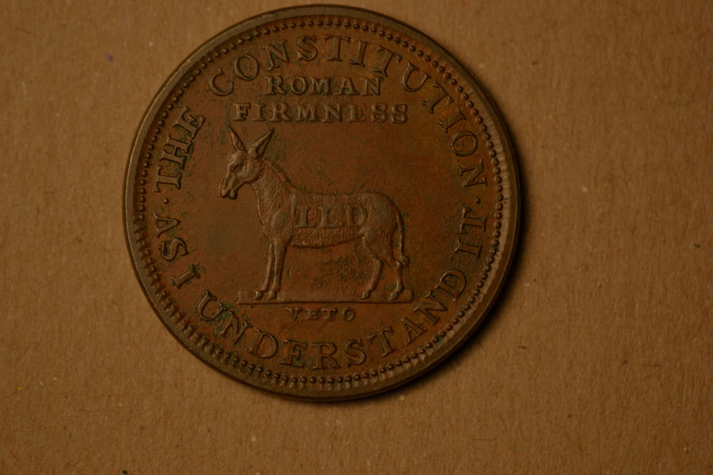 Hard Times Token- Roman Firmness- Nice AU with light surface roughness.